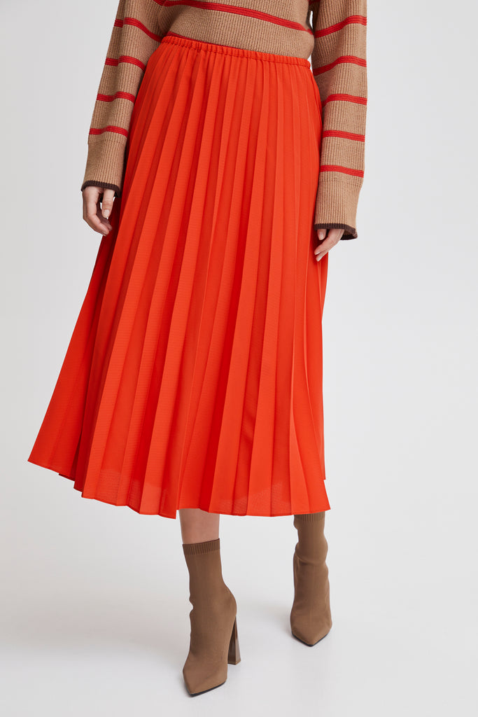 pleated skirt in orange